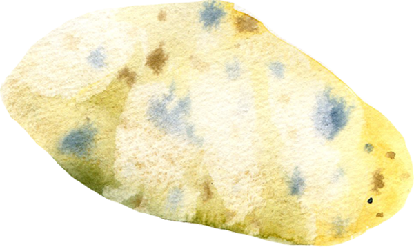 A light yellow rock with specks of blue and brown
